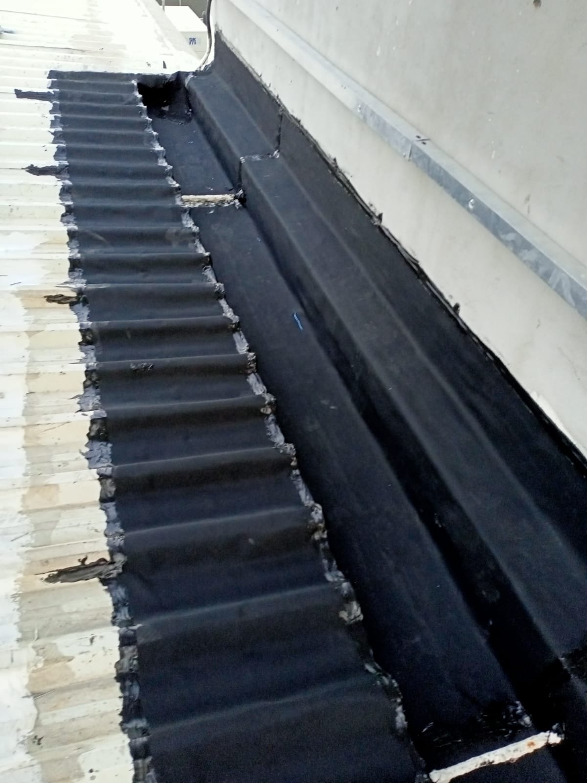 Metal Roof Gutter Waterproofing for Darwish Bin Ahmed & Sons Company by Leak Lock UAE