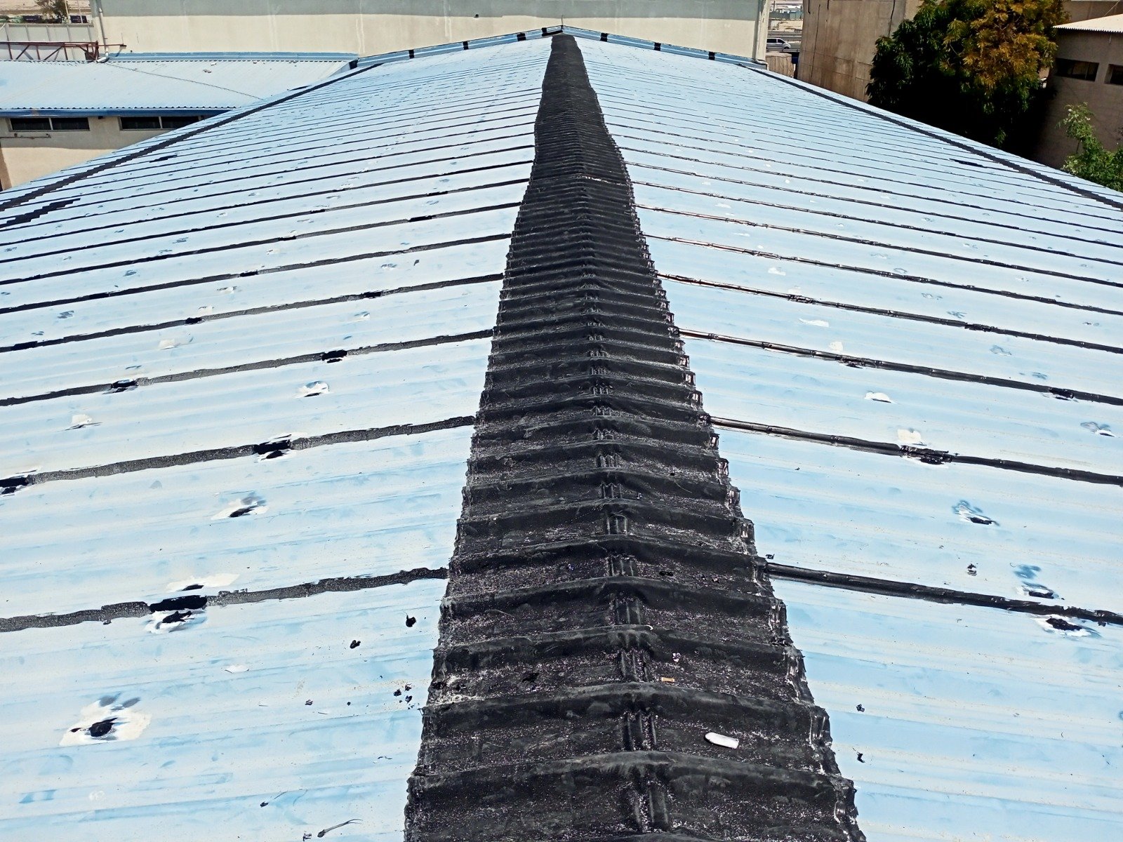 Metal Roof Waterproofing for AFSGT General Trading (Fakhruddin & Sons) by Leak Lock UAE